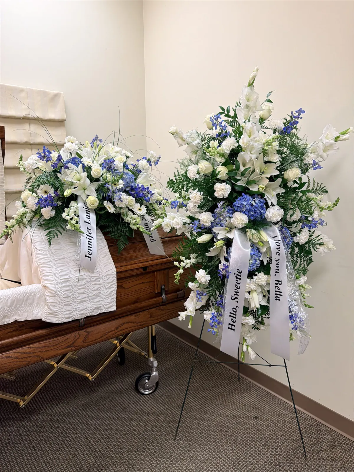 Casket spray and standing spray designed and set up by Vancouver Funeral Florals for a service at Evergreen Staples Funeral Home