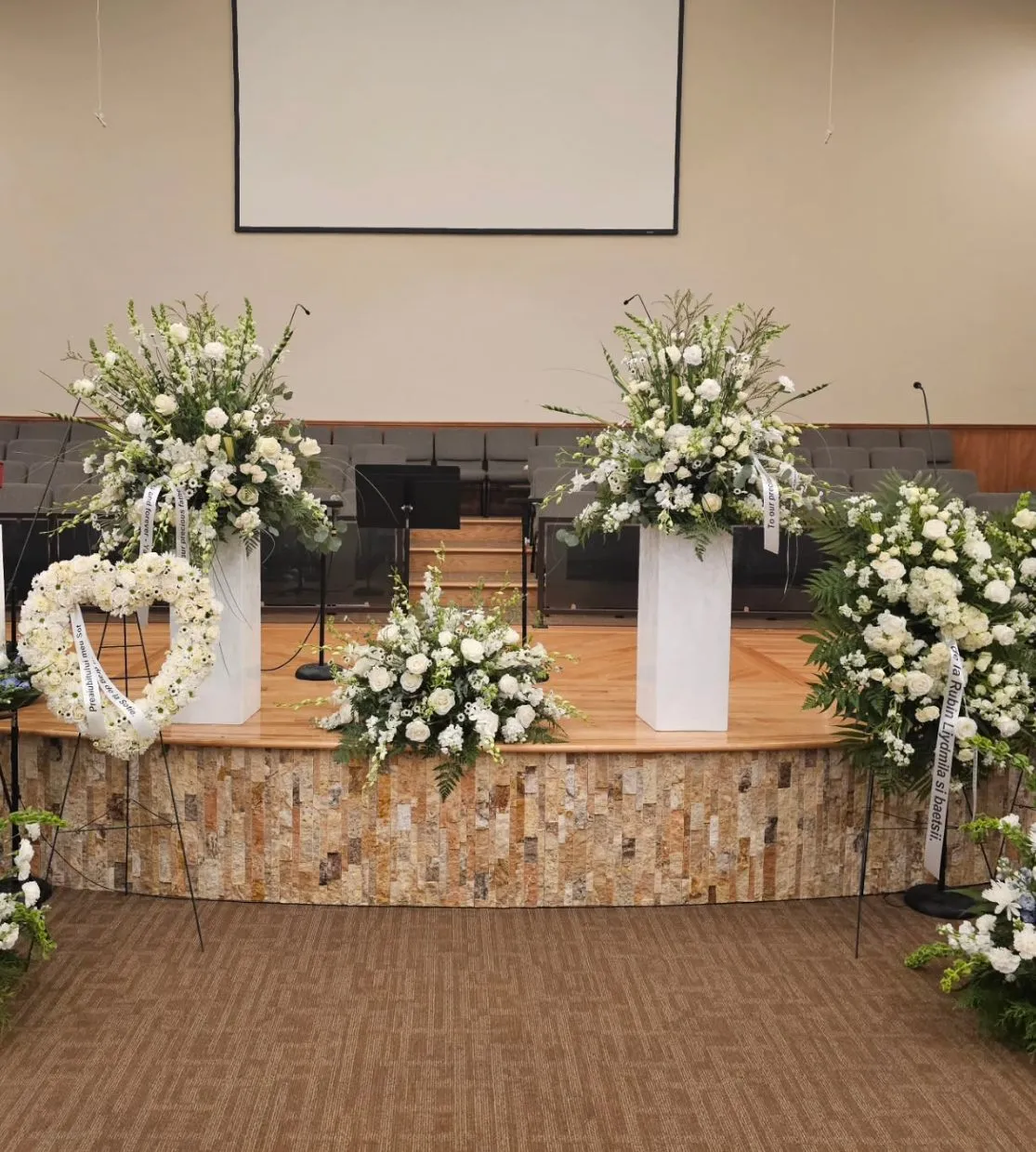 Large venue funeral flower setup Vancouver WA