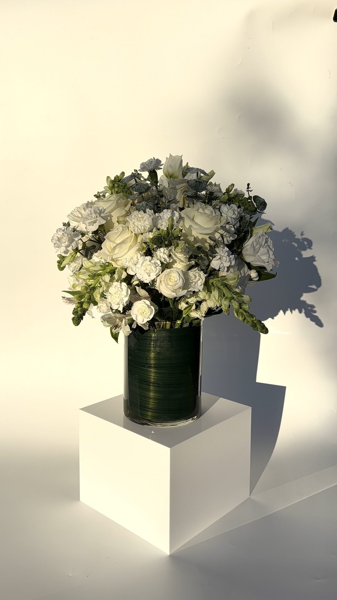 White rose and carnation sympathy arrangement in a vase Vancouver WA