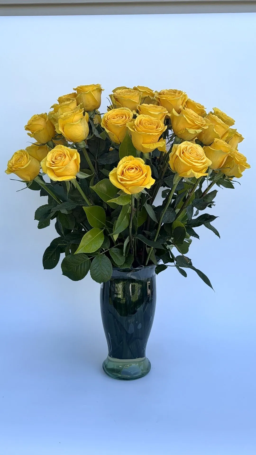 Yellow rose memorial arrangement in a vase Clark County WA